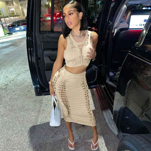 Fashion solid color hollow round neck vest slim skirt suit