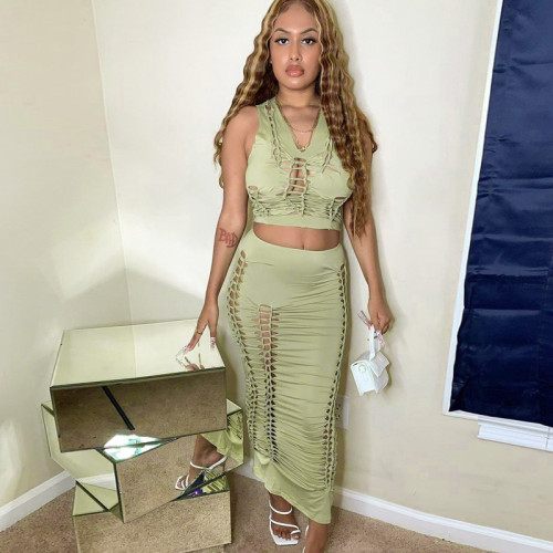 Fashion solid color hollow round neck vest slim skirt suit