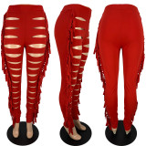 Fashion sexy solid color burnt tassel pants