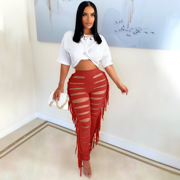 Fashion sexy solid color burnt tassel pants