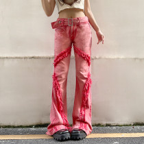 Low-rise denim flared trousers with metal waist buttons
