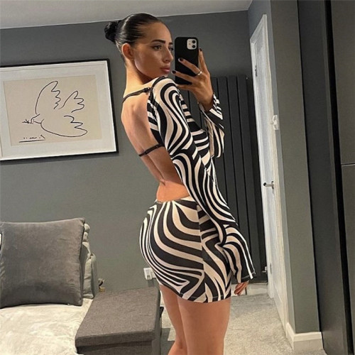 Fashionable sexy backless one-shoulder hollowed-out long-sleeved slim hip dress