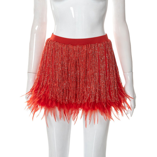 Fashion solid color tassel sexy feather bag buttock skirt women's dress