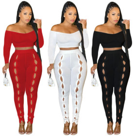 Sexy solid color one-shoulder empty navel-baring two-piece suit