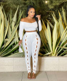 Sexy solid color one-shoulder empty navel-baring two-piece suit