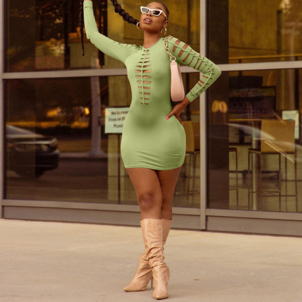 Fashion personality hollow round neck slim long sleeve hip dress