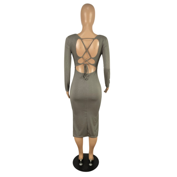 Solid color long-sleeved slit bandage pit-striped fabric sexy hip-lifting hollow seven-point skirt