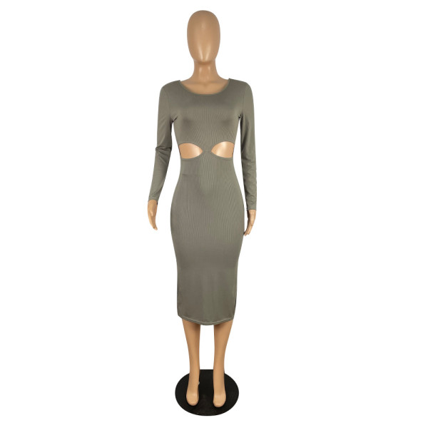 Solid color long-sleeved slit bandage pit-striped fabric sexy hip-lifting hollow seven-point skirt