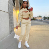 three-piece fleece drawstring hoodie with cotton tank top and jogger pants