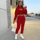three-piece fleece drawstring hoodie with cotton tank top and jogger pants