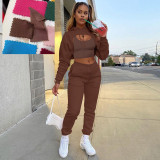 three-piece fleece drawstring hoodie with cotton tank top and jogger pants