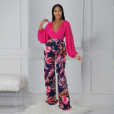 Two piece solid color dark V top and printed slacks