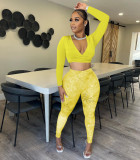 Two piece solid color cross tie top and printed trousers