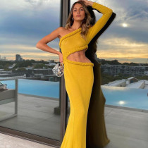 Personalized hollow bag buttocks twist wrapped hem long sleeve fishtail dress