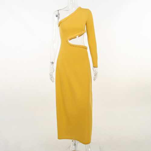 Personalized hollow bag buttocks twist wrapped hem long sleeve fishtail dress