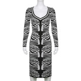 Black and white contrast V-neck long sleeve tight hip wrap wool one-piece dress