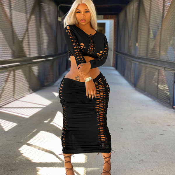 Fashion sexy hollow long sleeve top slim skirt suit