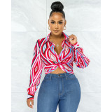 Fashion geometric printing twist button shirt top