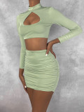 Autumn and winter sexy hollow out long sleeved hip wrap skirt pleated open navel two-piece set