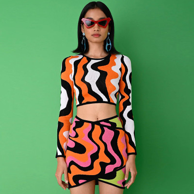 Round neck pullover long sleeve navel exposed low waist hip bag European and American women's short skirt suit