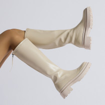 Small white boots with thick soles and high shafts are thinner than knees Small white boots with thick soles and high shafts are thinner than knees