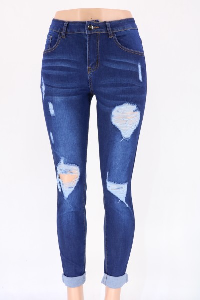 Women's jeans with holes and small feet