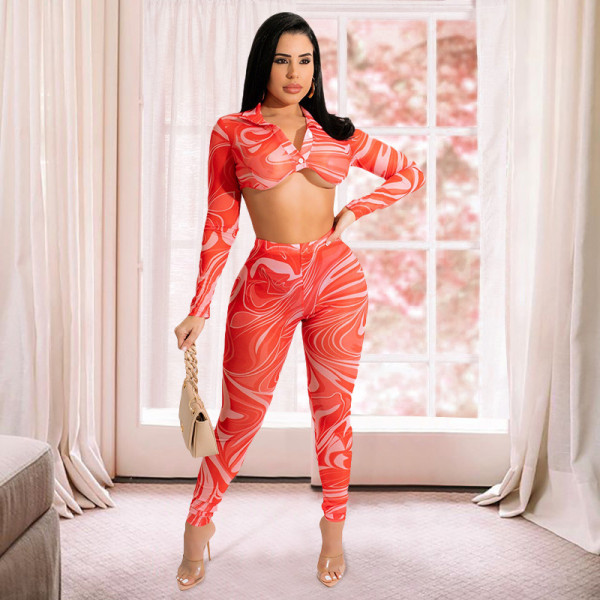Positioning printing tie dyeing hollow perspective screen women's two-piece suit [with buttons]