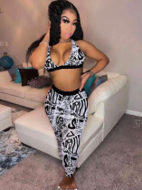 Printed suspender with exposed navel top, tight-fitting high-waisted trousers, sports casual suit