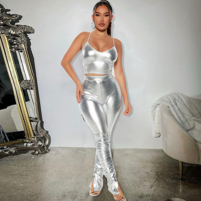 Two pieces of suspenders with exposed navel strap and metallic luster pleated trousers