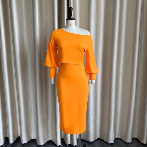 Solid color off-shoulder long-sleeved top with buttocks and high waist skirt suit two-piece