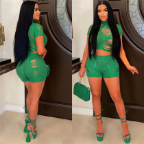 Solid color knitted sexy hollow hole perspective high-waisted buttocks shorts suit