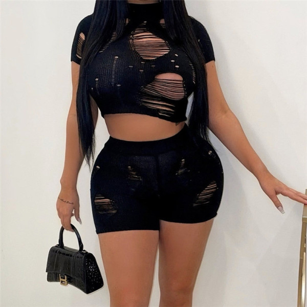 Solid color knitted sexy hollow hole perspective high-waisted buttocks shorts suit