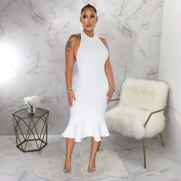 Solid color hanging neck dress with buttocks and fishtail skirt