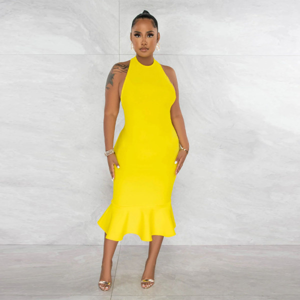 Solid color hanging neck dress with buttocks and fishtail skirt