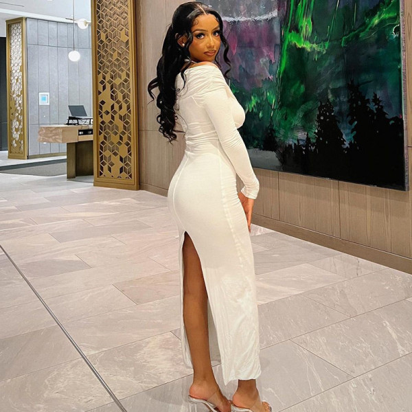 Sexy V-neck hanging neck solid color long-sleeved split buttock pleated fashionable dress