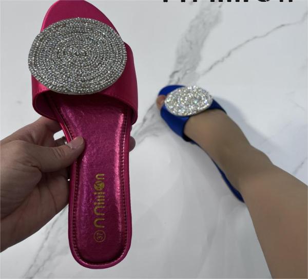 Flat sandals with rhinestone slippers on the outside
