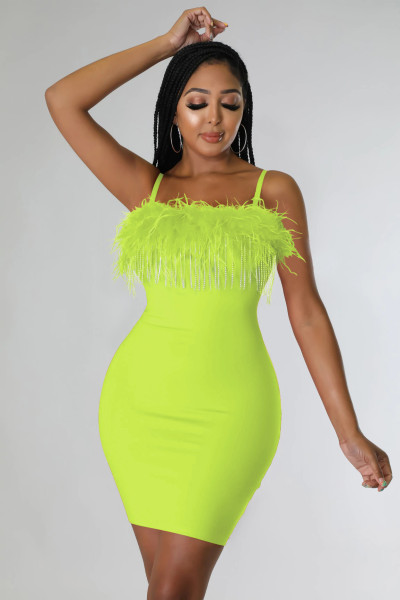 Fashionable hip wrap skirt, feather tassel, solid color suspender, new party dress