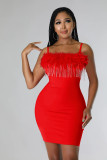 Fashionable hip wrap skirt, feather tassel, solid color suspender, new party dress
