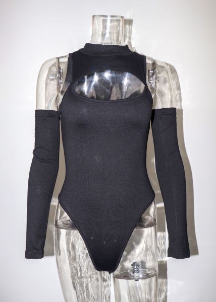 Tight and sexy bare chest bottomed shirt with irregular hollow out long sleeved slim fitting off shoulder jumpsuit
