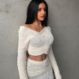 Solid color slanted shoulder long sleeved top slim fitting split short skirt set