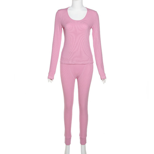 Solid color slim fitting long sleeved top high waisted tight pants casual set