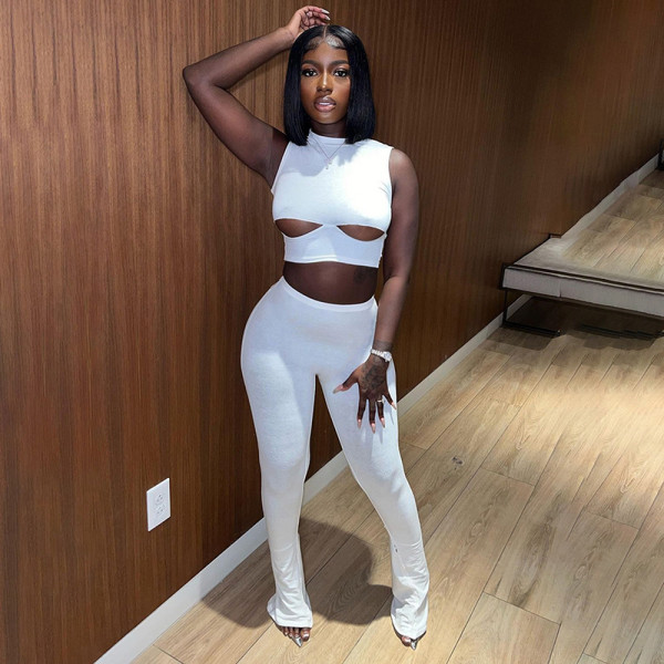 Fashion hollow out sleeveless round neck top with micro flared pants casual set
