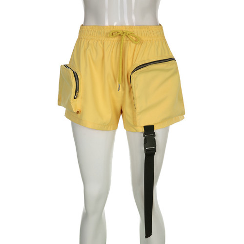 Solid woven fabric high waisted elastic drawstring asymmetric stitching large pocket trend work style casual shorts