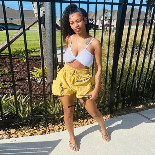 Solid woven fabric high waisted elastic drawstring asymmetric stitching large pocket trend work style casual shorts