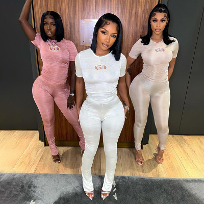 Round neck D-line embroidered short sleeved T-shirt with high waist and buttocks, tight pants, sports and casual spicy girl set