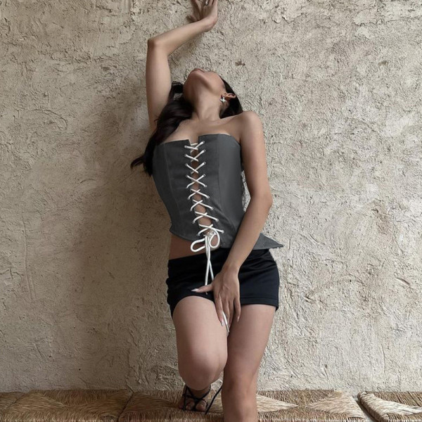 Chest strap cut out waist sloping hem vest