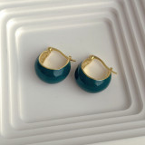 Minimalist design with circular metal drip earrings