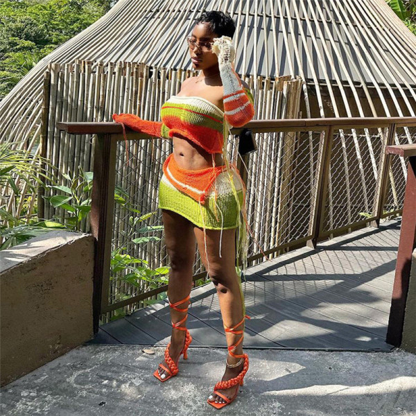 Fashionable knitted contrasting color bra top with high waist and buttocks tight short skirt set