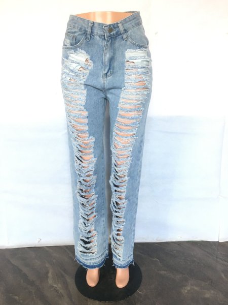 Versatile, slim fitting, sexy, slightly elastic, perforated, and slightly flared jeans