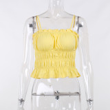 Slim fitting short open back top with drawstring pleats and versatile tank top